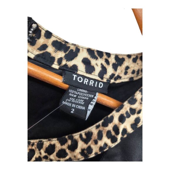 Torrid Sleeveless Peplum Animal Print Top - Picture 3 of 7
